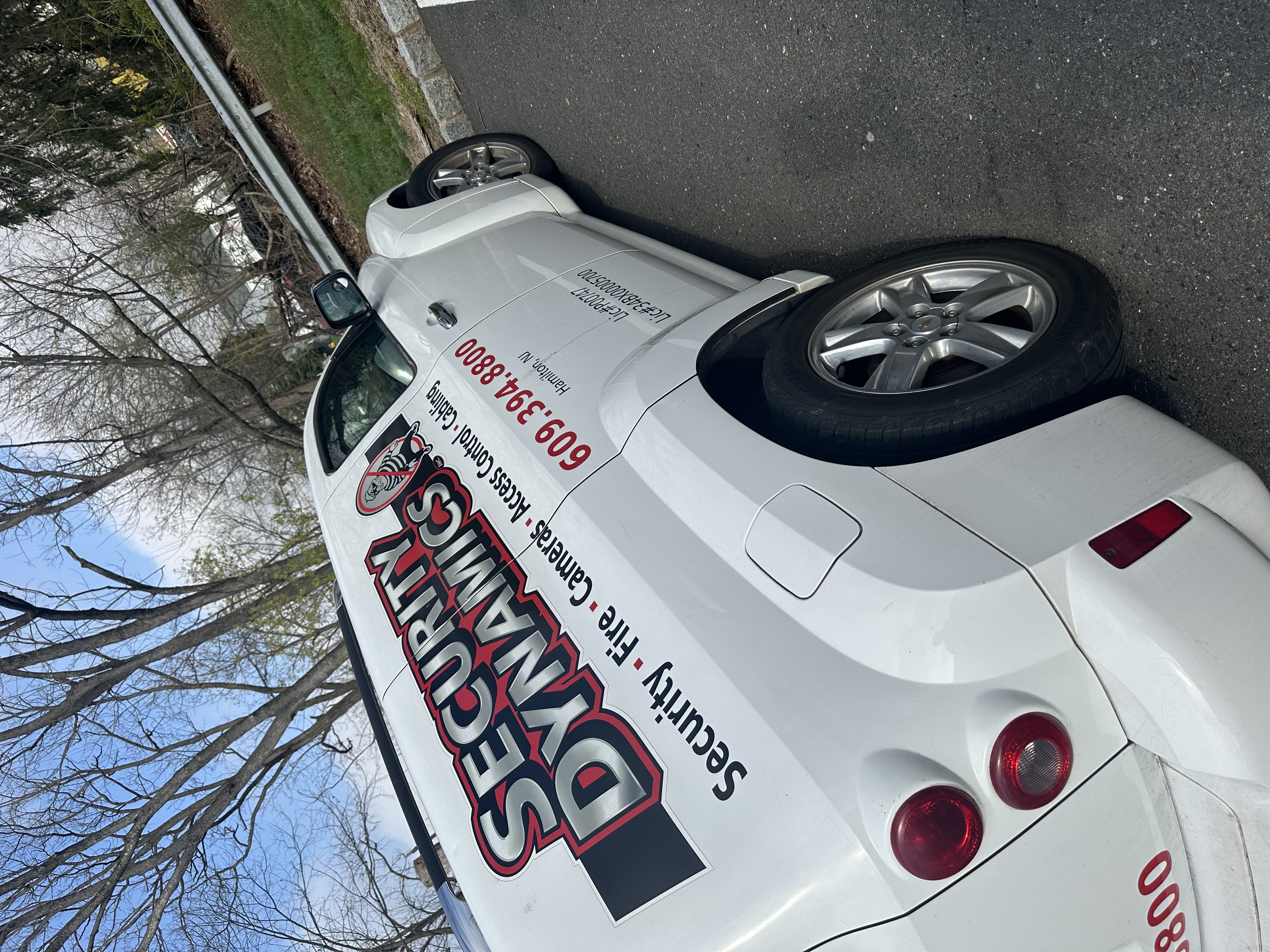 Security Dynamics branded service car for on-site security assessments